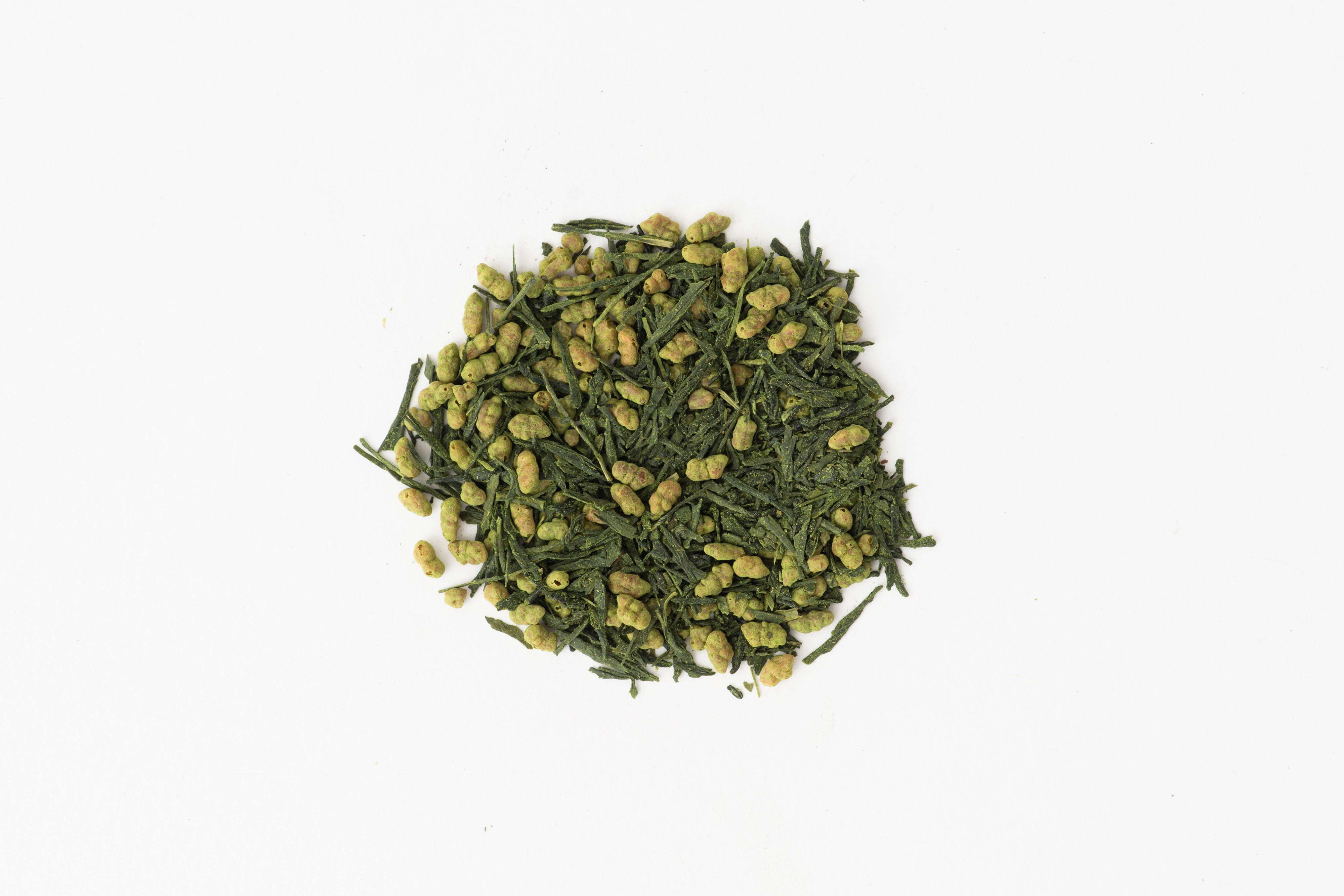 Circle of loose leaf tea. This tea is Organic Genmaicha Matcha, a blend of two green teas from True Tea, a tea company based in Portland, Oregon