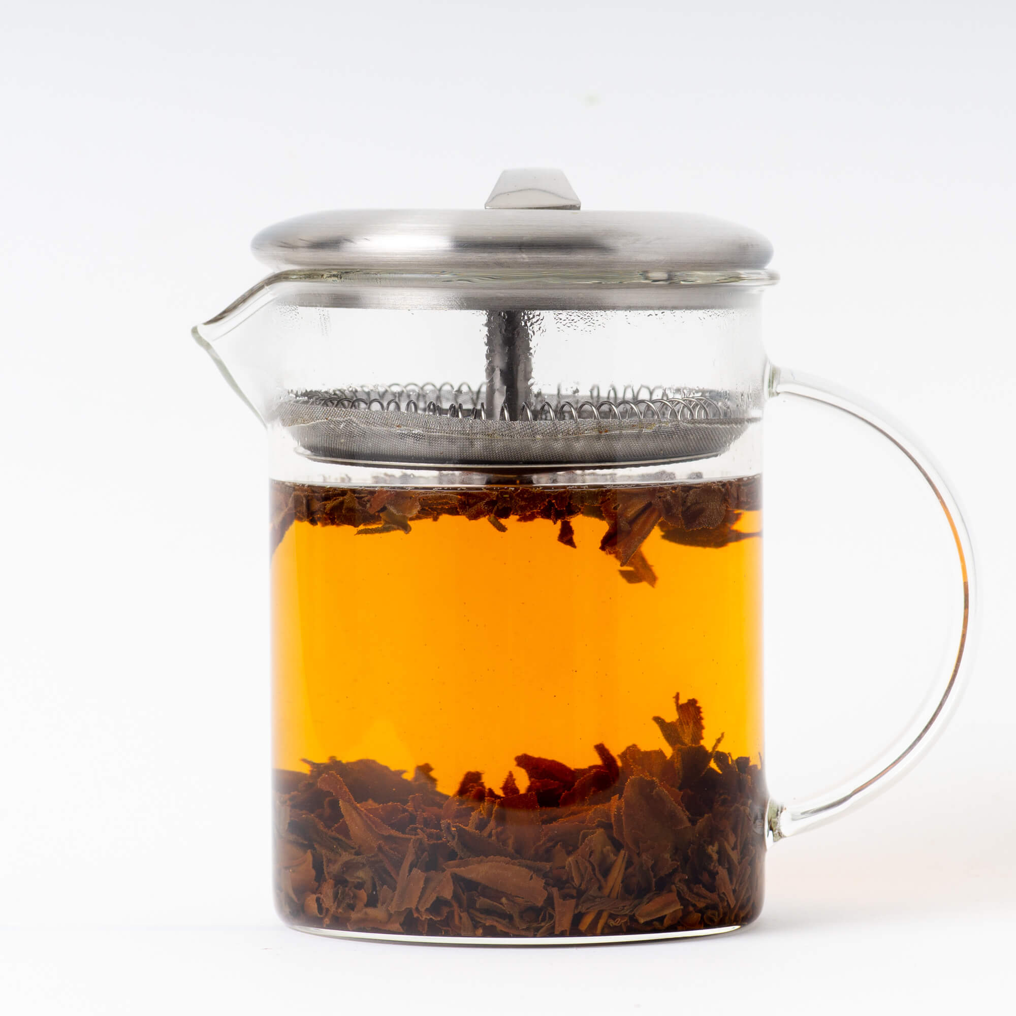 Glass brewer of brewed Organic Earl Grey. This Organic Earl Grey comes from True Tea, a tea company based in Portland, Oregon